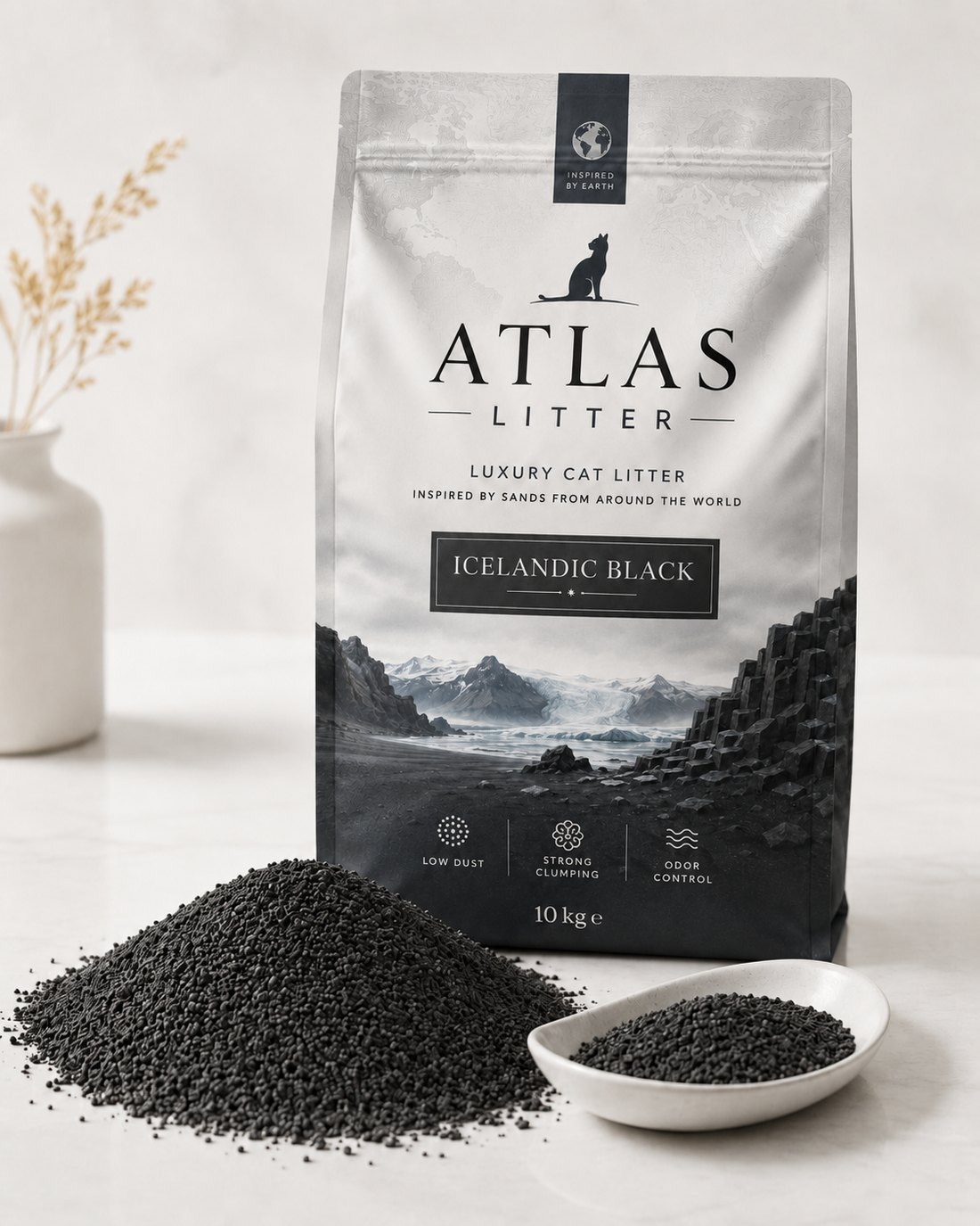 Atlas Litter Icelandic Black — dark volcanic mineral granules and packaging